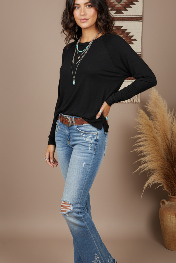 Black long-sleeve top on model