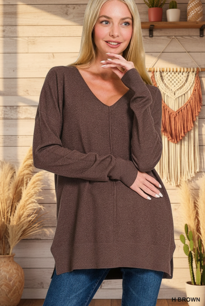 Brown sweater with boho western background