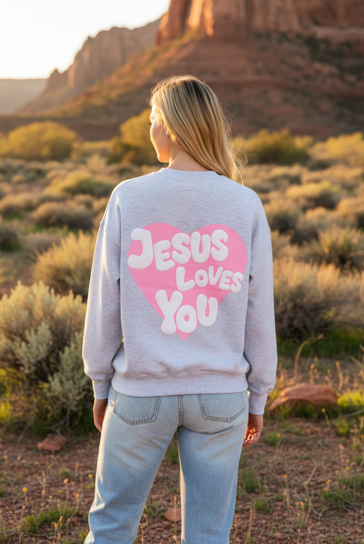 Light gray sweatshirt with Jesus Loves You back graphic and desert landscape