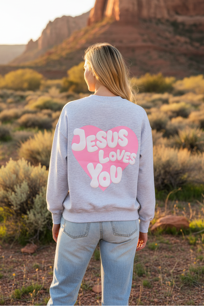 Light gray sweatshirt with Jesus Loves You back graphic and desert landscape