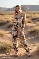 Abstract watercolor print jumpsuit with desert dunes landscape