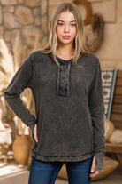Ash black distressed pullover top on model - corrected