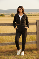 Black cropped hoodie and jogger set without drawstring on pants with western boho ranch background