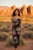Black floral print mesh midi dress with desert landscape