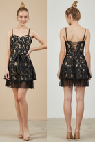 Black lace dress with fringe on model