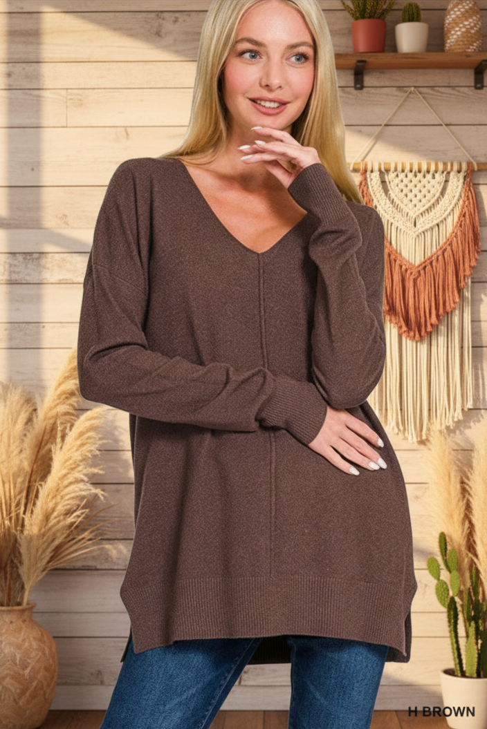 Brown sweater with boho western background
