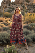 Burgundy paisley midi dress with desert landscape