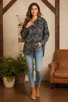 Camo shacket on model with styled background