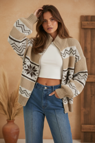 Cream Fair Isle cardigan on model with styled background