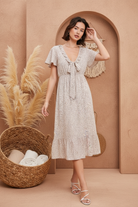 Cream floral midi dress with alternate background