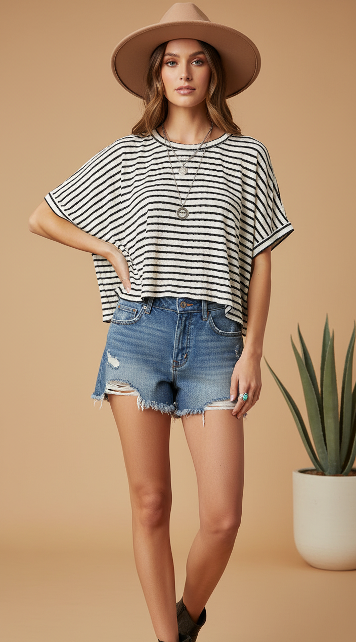 Cropped black and white striped top on model