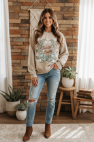 "Feelin' Lucky" graphic sweatshirt on model with styled background