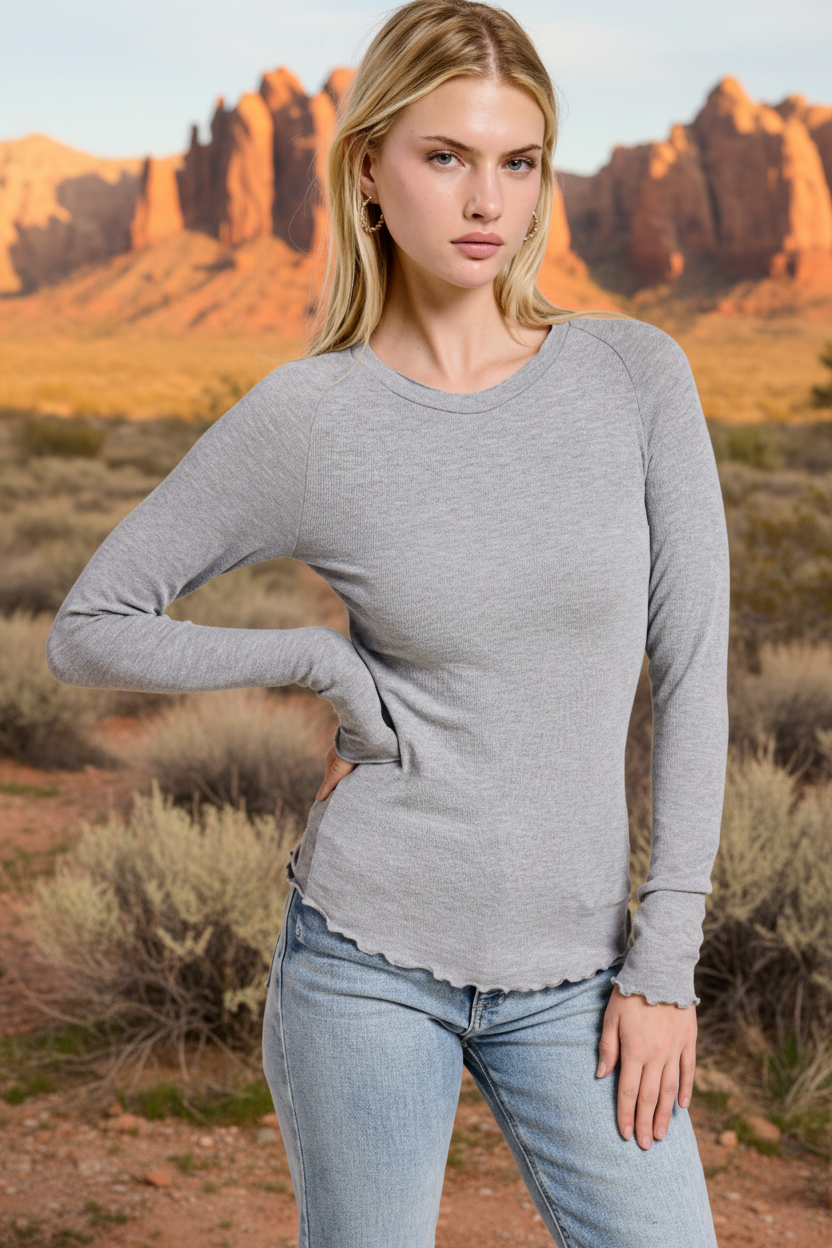 Gray long sleeve top with lettuce edge trim and desert landscape