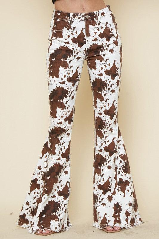 KAYDENCE COWPRINT FLARED DENIM PANTS - West End Boutique