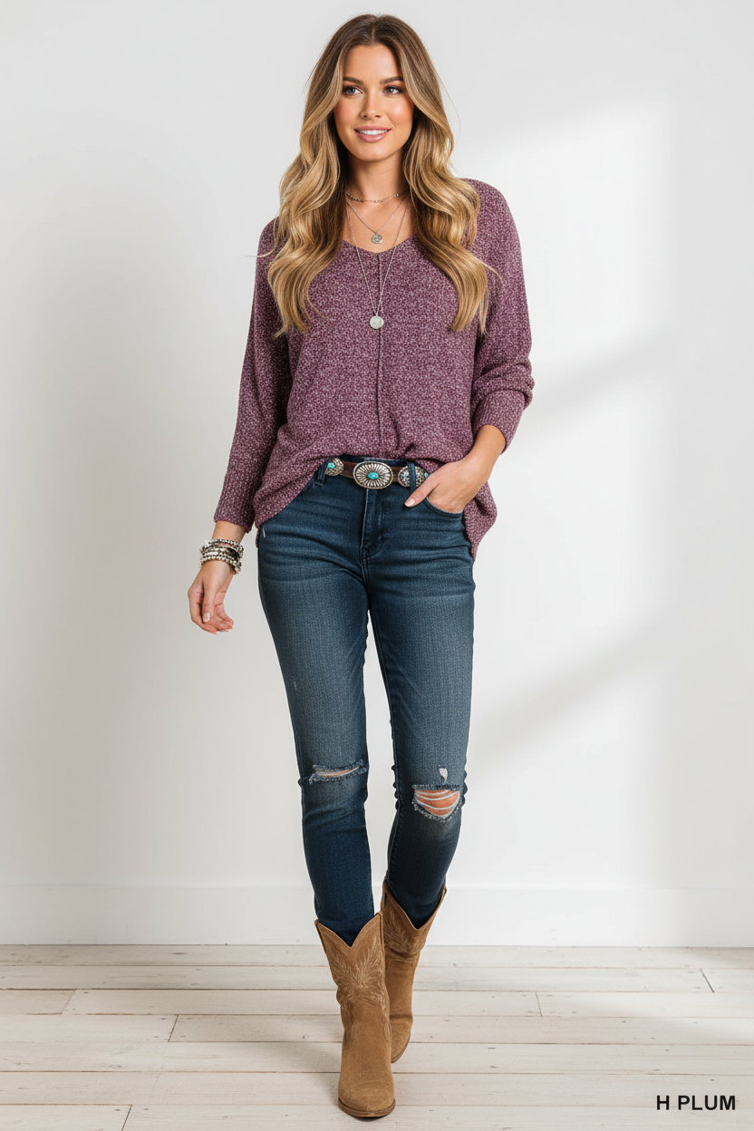 Plum heathered sweater on model