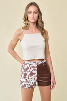 SANDY TWO TONE COW PRINT SHORTS WITH PU CONTRAST - West End Boutique