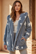 Soft blue-gray fuzzy sherpa jacket with white stars - muted color