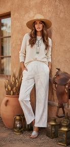 White cream camo sweatpants on model - regular length